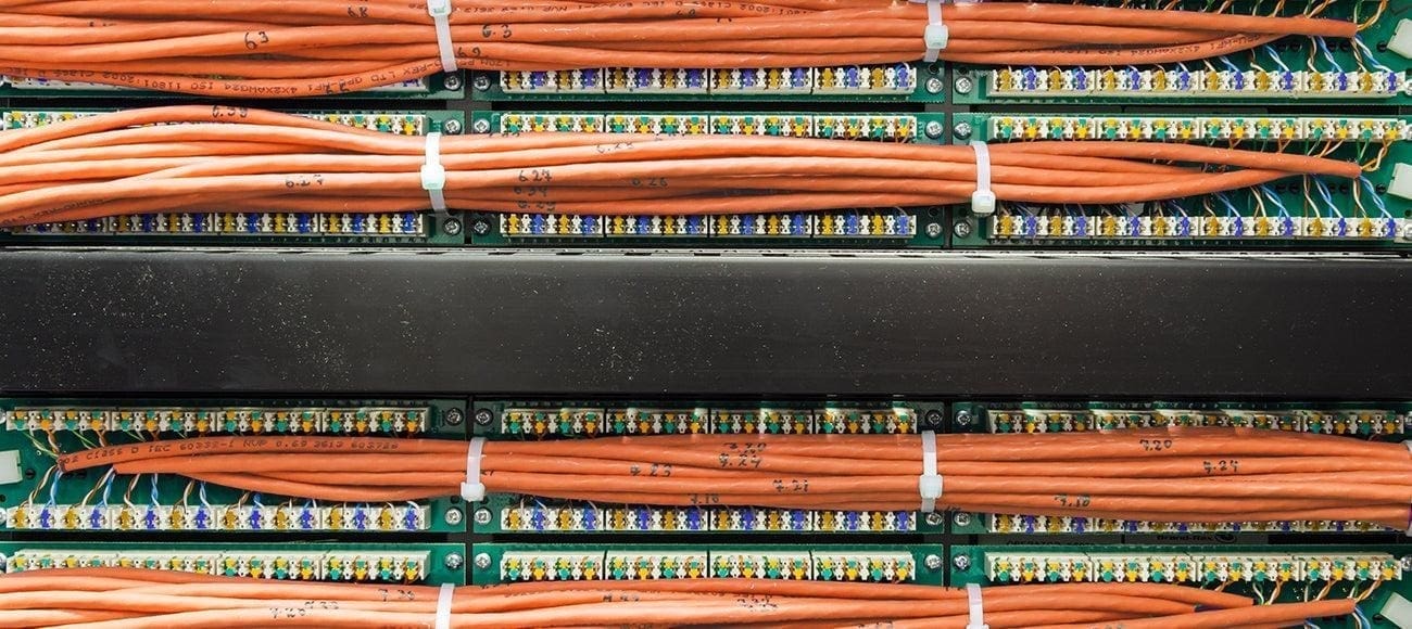Network cables organized in a server rack.