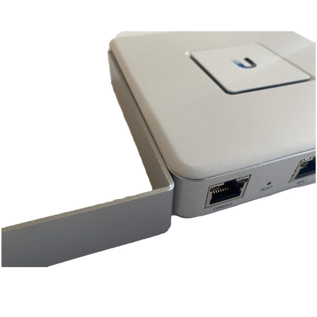 White network device with visible Ethernet ports.